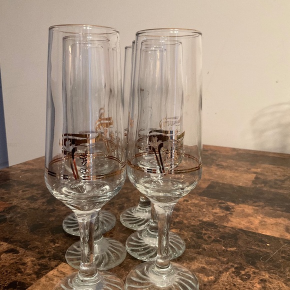 6 …1988 Vintage Calgary Winter Olympics flute glasses with a 22k gold-accent - Picture 1 of 1